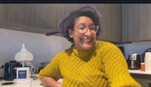 Kristen sitting in the kitchen part of her DC living kitchen